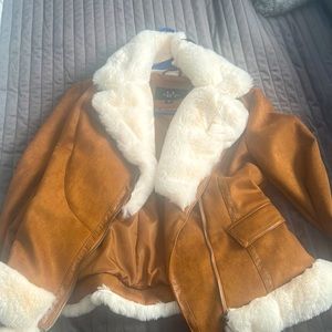 Brown suede and fur coat size medium. Never been worn still has tags